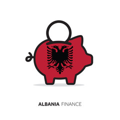 Albania economic concept. Piggy bank with national flag.