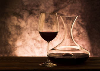 Wall Mural - Decanter with red wine and glass on table