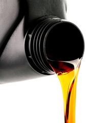 Wall Mural - pouring car engine oil from bottle isolated on white background
