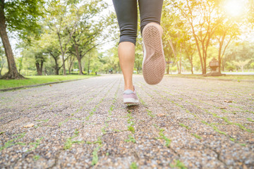 Sporty man jogging or exercise in national park on early morning .Sport concept.