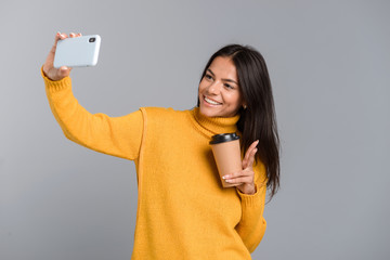 Wall Mural - Portrait of a happy casual young woman