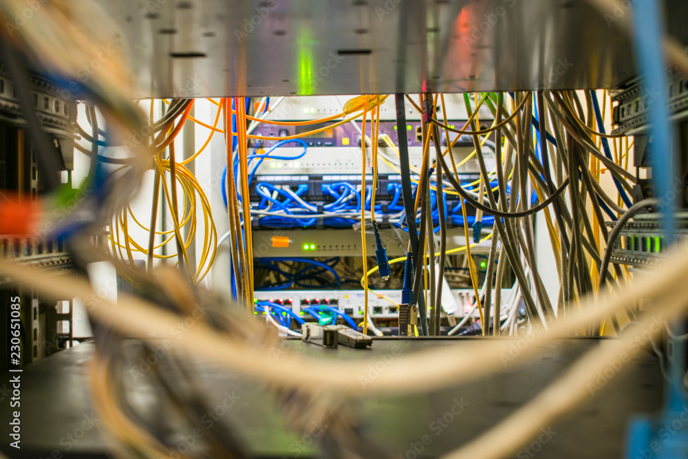 Many wires are in the rack with the switching equipment of the Internet ...