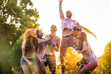 Friends playing with holi powder