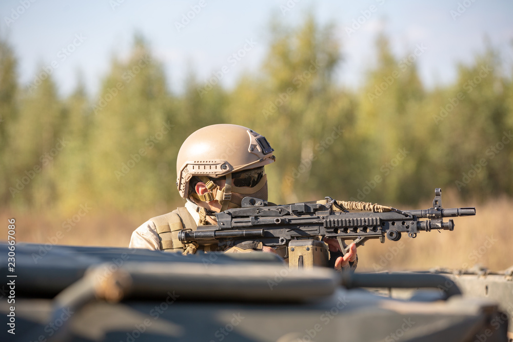 special forces, soldier assault rifle with silencer, optical sight ...