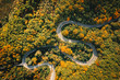 Extreme winding road in sunset light. Aerial view.