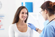 © Kalim - Adult woman having a visit at female doctor's office