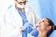 © Kalim - Adult woman having a visit at the dentist's