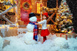 © Andrey Kiselev - girl and snowman