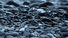 Smooth Beach Stones Background. Abstract Summer Texture.