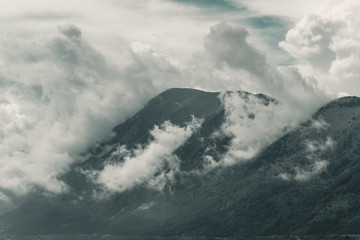 Leinwandbilder - impressive mountain range covered by clouds