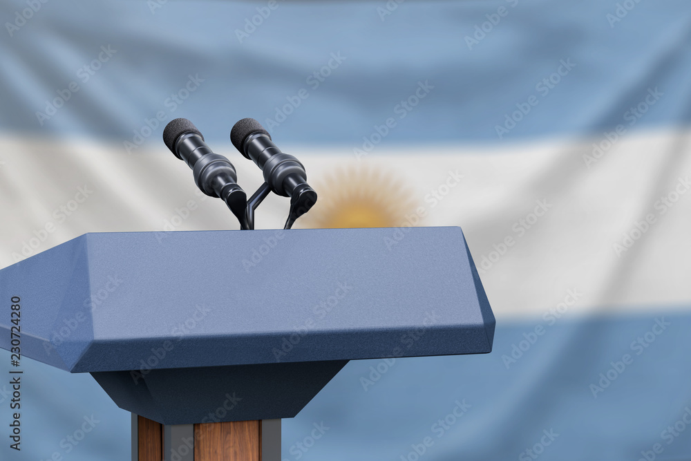 Podium lectern with two microphones and Argentina flag in background ...