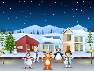 Wall Mural - Children enjoy wearing different costumes in winter