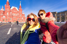 Happy Tourists Visiting State Historical Museum On Red Square In Moscow, Russia ,which Successful Traveling Couple In Love Taking A Selfie On Phone