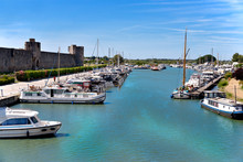 Port Of Aigues Mortes, French City Walls In The Gard Department In The Occitanie Region Of Southern France