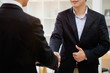 © Prathankarnpap - Business Partnership concept. businessman shaking hands finishing up a meeting and thumb up.