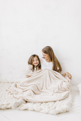 Wall Mural - young beautiful mother with her daughter