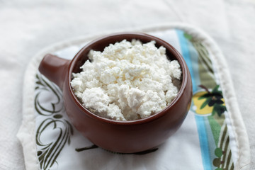 Cottage cheese in a bowl, closeup