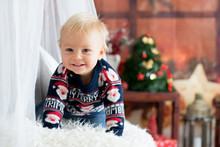Little Baby Toddler Boy, Playing With Christmas Decoration At Home