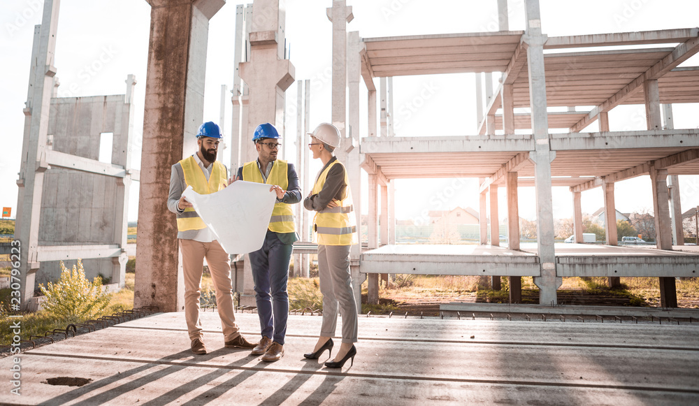 The two architects are trying to explain to their female boss why much has not been done yet.