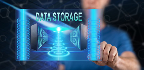 Wall Mural - Man touching a data storage concept