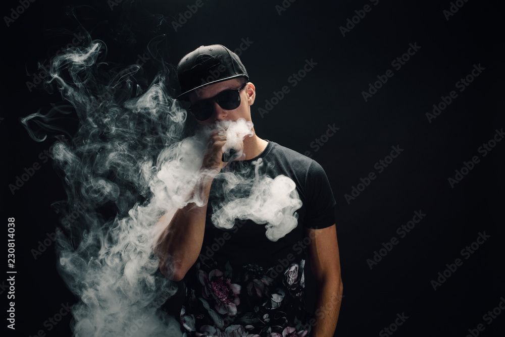 vape man Man Vaping Images – Browse 29,627 Stock Photos, Vectors, and Video main image 1