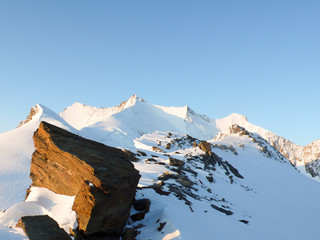 Canvas Print - Mischabel mountain range in the Swiss Alps above Saas Fee on a beautiful late fall evening