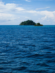 lonely island in the middle of the sea.