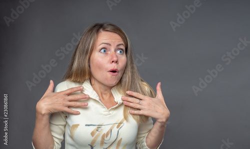 Woman Emotion Surprised And Excited Woman With Loose Blonde Hair