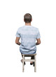© psychoshadow - Rear view full length portrait of pensive young man sitting on a old chair and meditate isolated over white background.