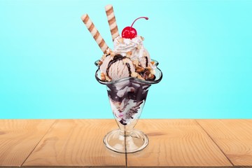 Poster - Chocolate ice cream in glass on wooden table