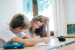 © karrastock - Couple young students studying at school