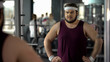 © motortion - Fat man looking disappointed because of bad result after weight loss trainings
