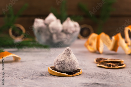 Chocolate Truffle With Powdered Sugar Powder Dried Lemon Slices