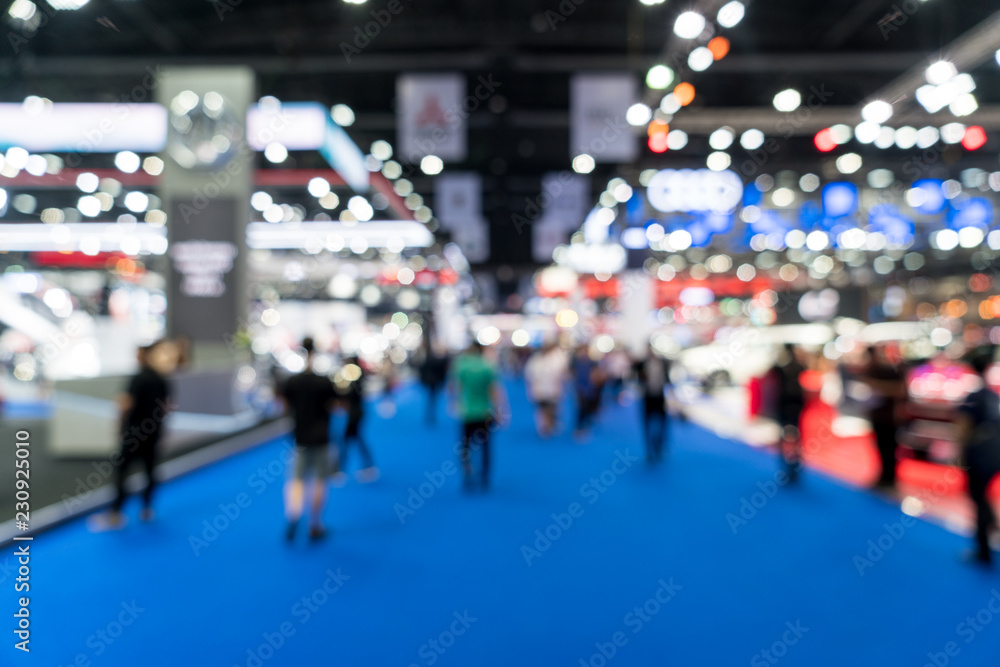 Blur, defocused background of public exhibition hall. Business tradeshow, job fair, or stock market. Organization or company event, commercial trading, or shopping mall marketing advertisement concept - obrazy, fototapety, plakaty 