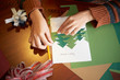 Hands of woman making greeting card for Christmas