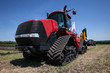© dobrovizcki - heavy red tractor at agricultural exhibition in motion