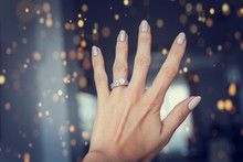 Diamond Ring On A Finger.