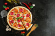 © rostyslav84 - Tasty pizza with salami and cheese on black background
