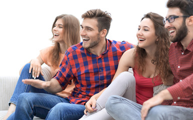 Wall Mural - young people watch your favorite show sitting on the couch.