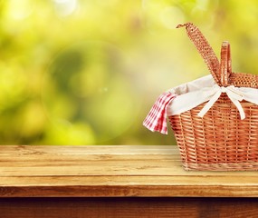 Sticker - Picnic Basket with napkin om nature background