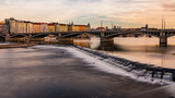 Fototapeta Kosmos - View from the river to Jirasek Bridge and the Vltava River. A sunny day at the Vltava river in Prague