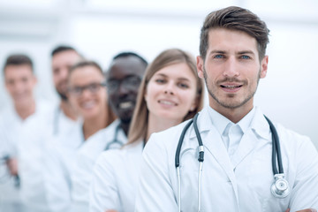 Wall Mural - doctors team showing finger in camera