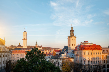 Wall Mural - Lviv cityscape view on the old town with town hall and churches during the sunset in Ukraine