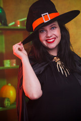 Photo of smiling witch in hat