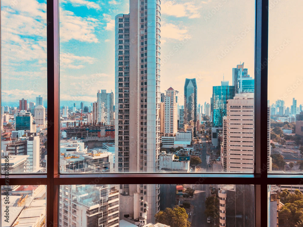 view from skyscraper window on modern city skyline  - obrazy, fototapety, plakaty 