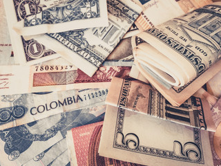 Cash money US Dollars and Colombian Pesos   -