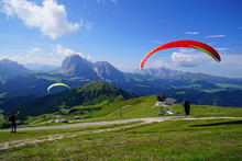 Parapentes Launched From A High Alpine Meadow