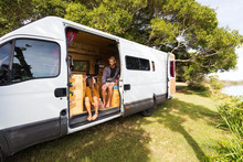 Van Life Couple In Bohemian Camper Van At A Scenic Australian Location