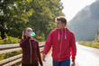 © .shock - young couple jogging along a country road