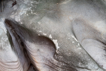  Smooth volcanic stone texture. Black and grey stone closeup. Weathered grungy surface photo background.
